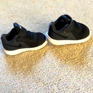 All black Nike tennis shoes - baby